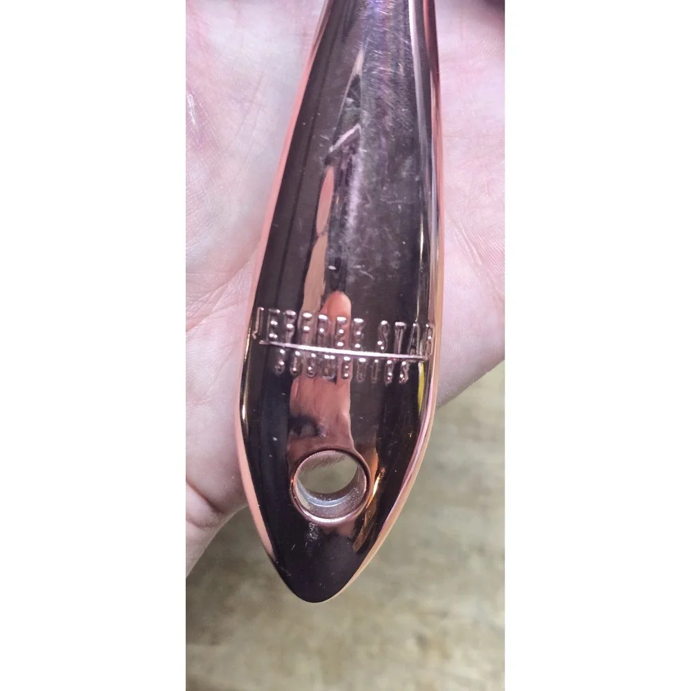 Jeffree Star Cosmetics Rose Gold Chrome Star Hand Mirror.